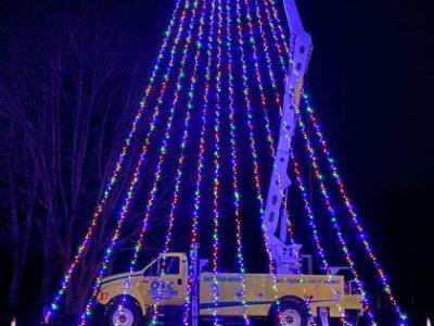 Custom Exterior Landscape setting up holiday lights in Rocky Hill