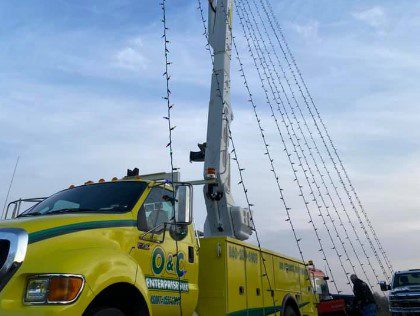 Custom Exterior Landscape setting up holiday lights in Rocky Hill