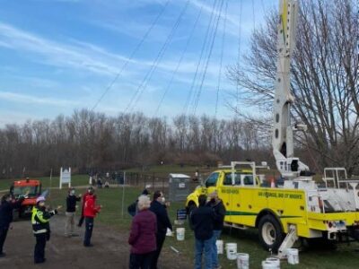 Custom Exterior Landscape setting up holiday lights in Rocky Hill