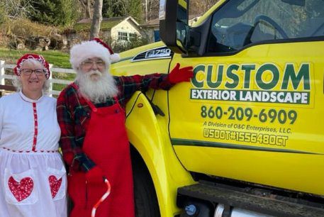 Custom Exterior Landscape of Newington - Truck with Santa and Ms Claus