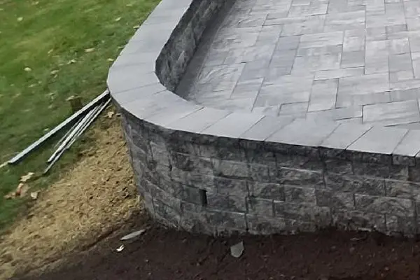 Rounded retaining wall for patio in West Hartford